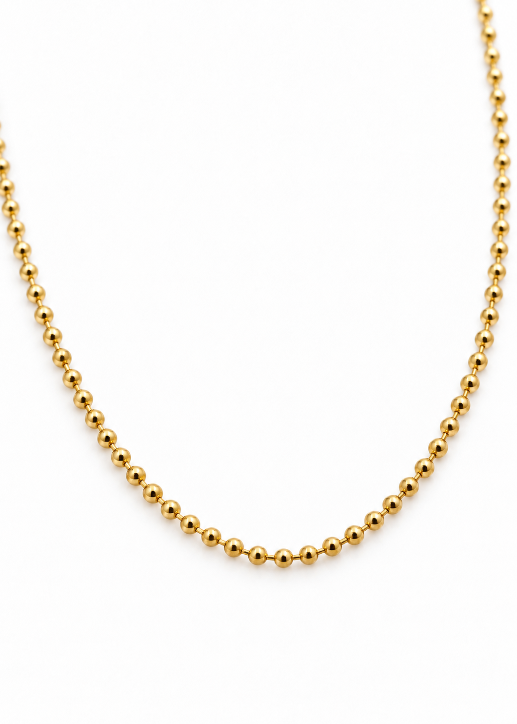 Close-up of the small polished gold beads and connectors of the 0.9 mm Ball Chain.