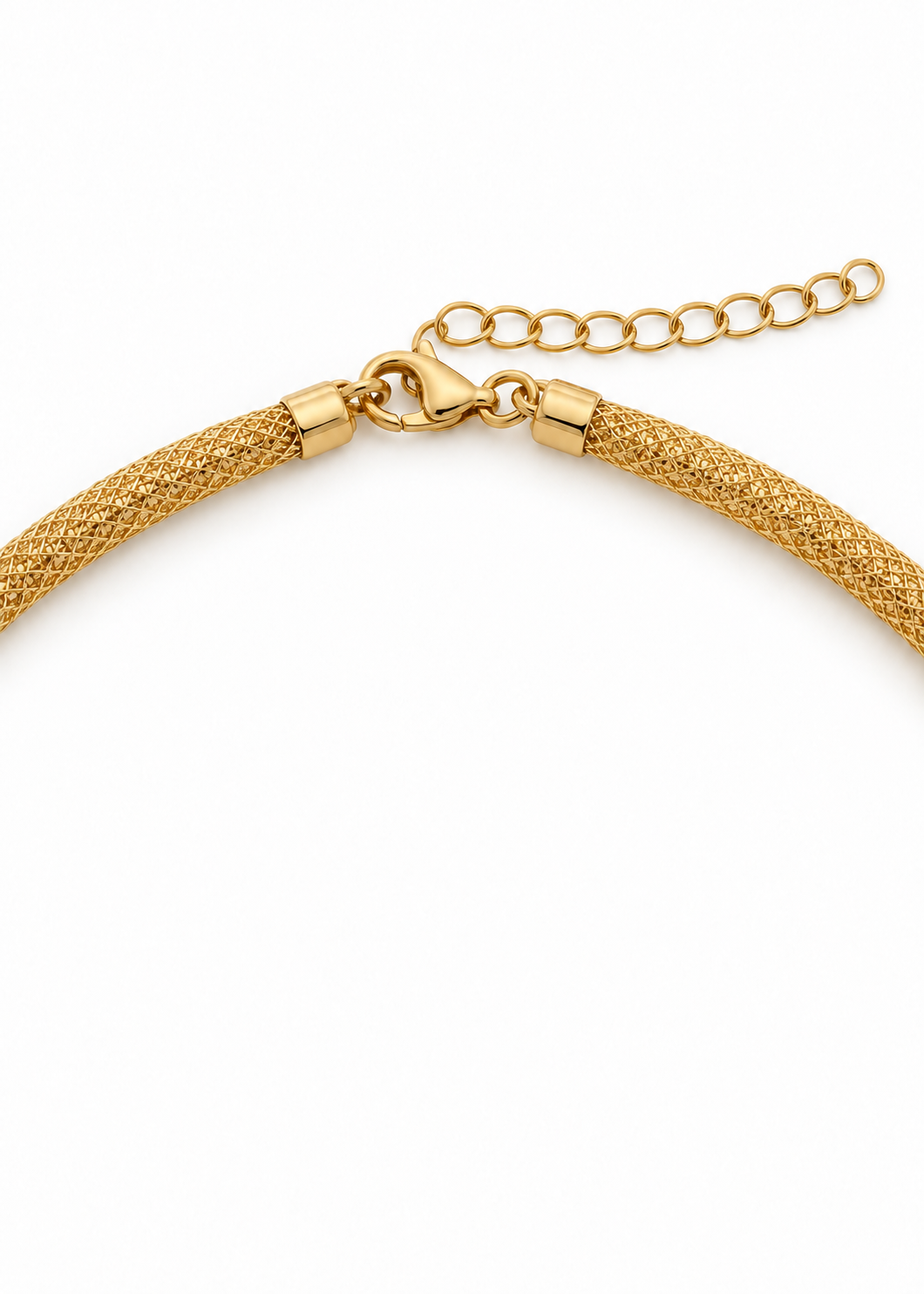 Close-up of the lobster clasp and extension chain on an 18K gold mesh necklace.