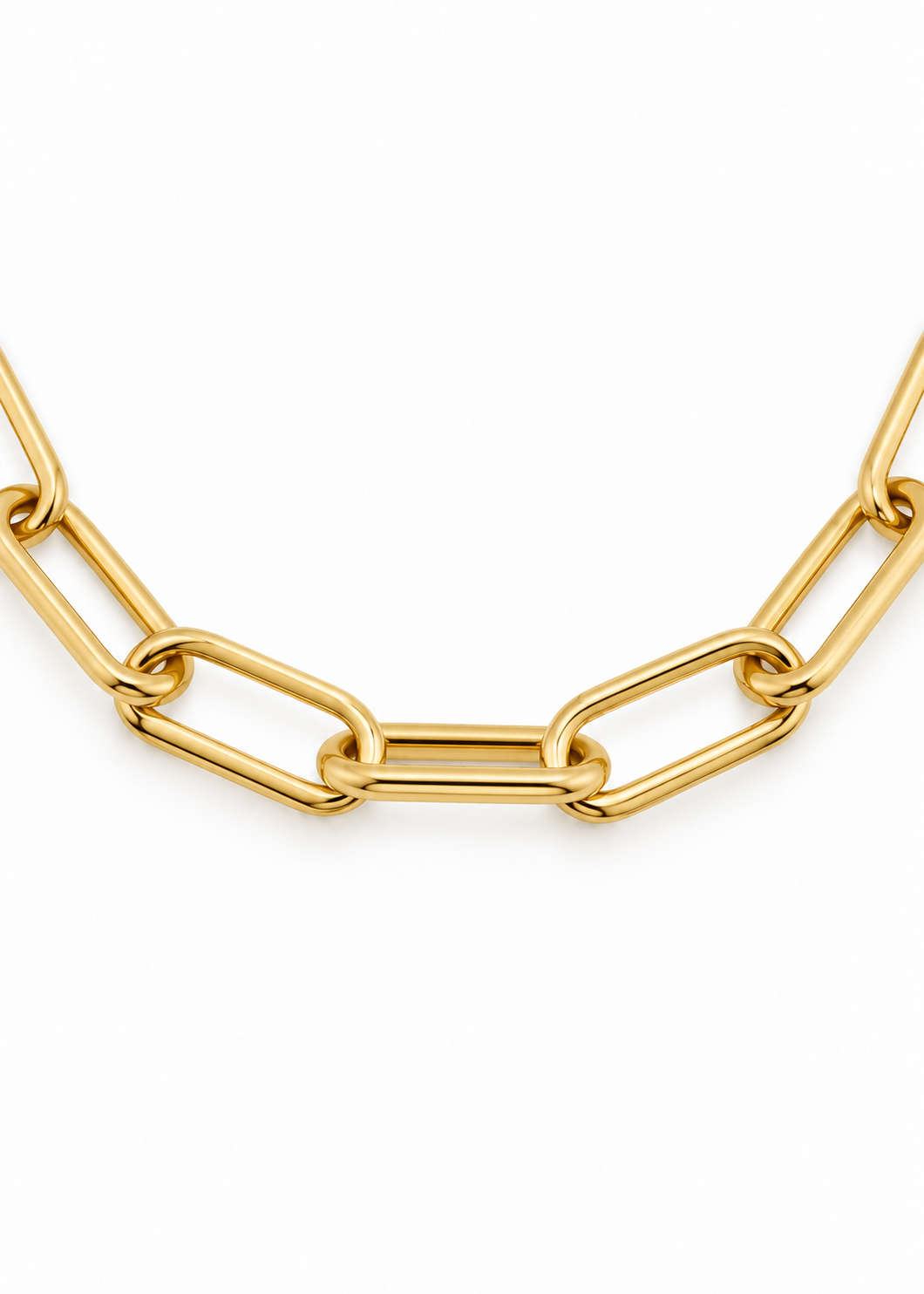 Close-up of polished elongated links on the Italian 18K yellow gold Paperclip bracelet against a white background.