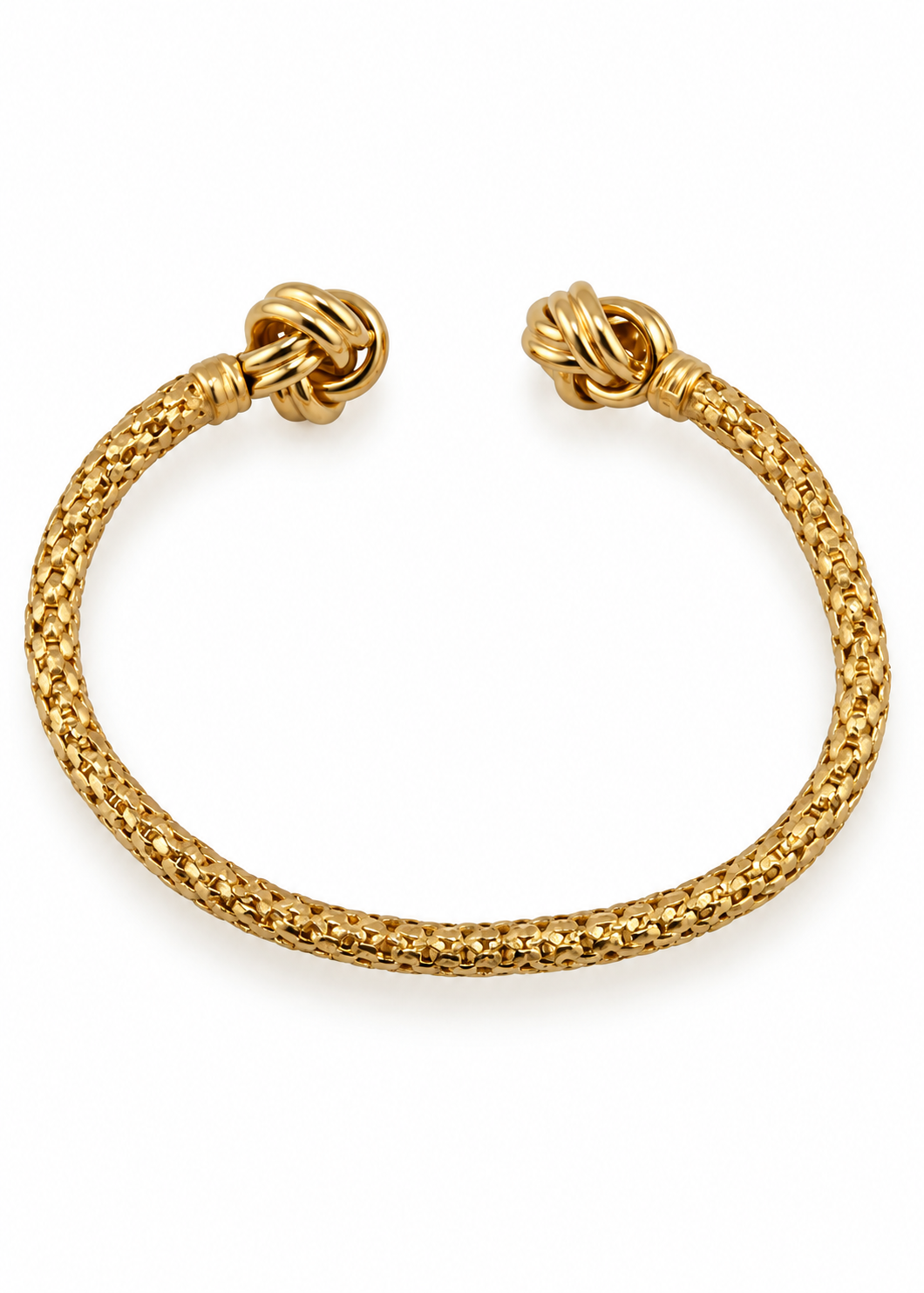 Overhead view of the 18k Gold Nodo d'oro Cuff on a white background.
